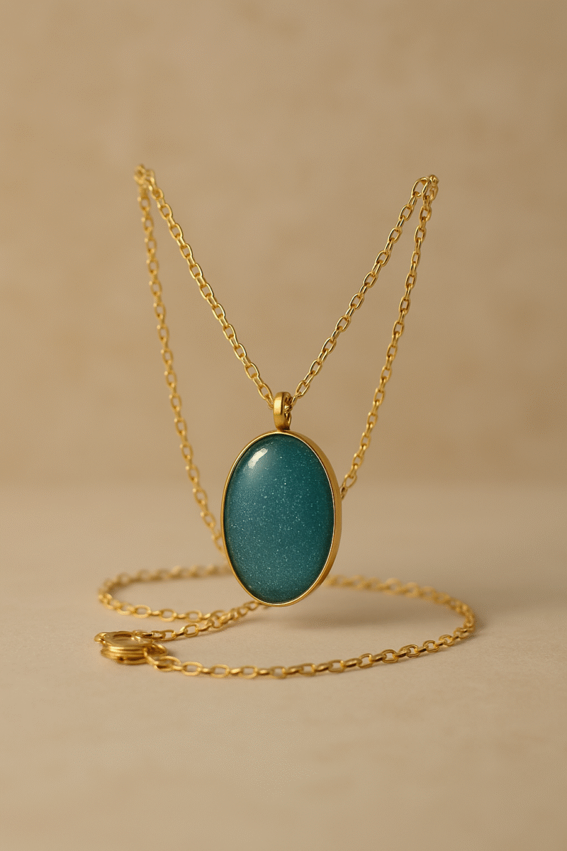 Teal Stardust Oval Necklace – Glitter Resin Pendant with Gold Chain - Image 3
