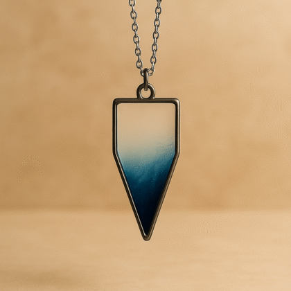 Ocean Mist Resin Pendant Necklace – Transparent Blue Gradient Arrowhead with Silver Chain