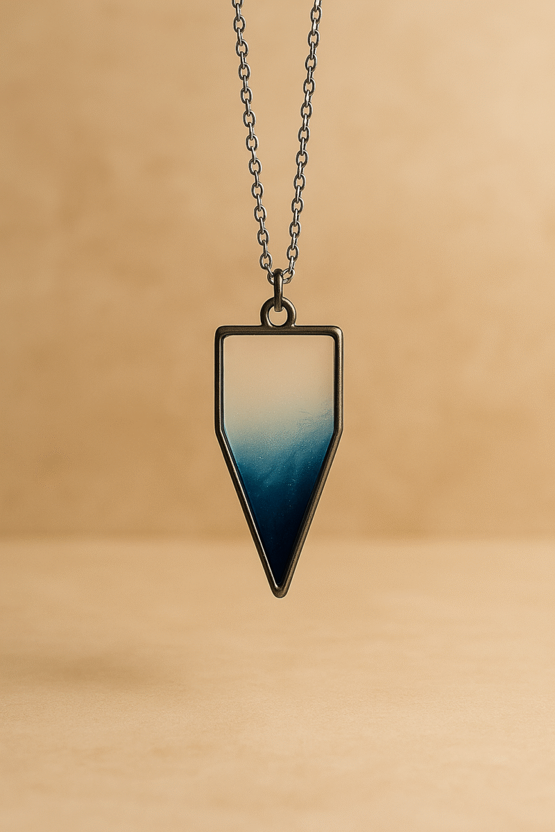 Ocean Mist Resin Pendant Necklace – Transparent Blue Gradient Arrowhead with Silver Chain