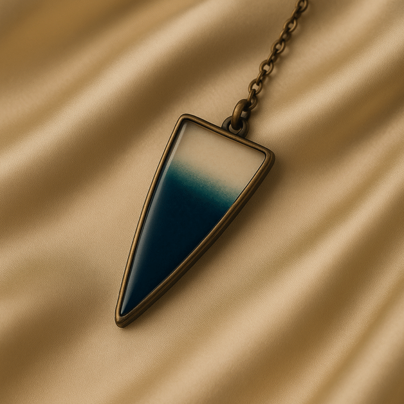 Ocean Mist Resin Pendant Necklace – Transparent Blue Gradient Arrowhead with Silver Chain - Image 3