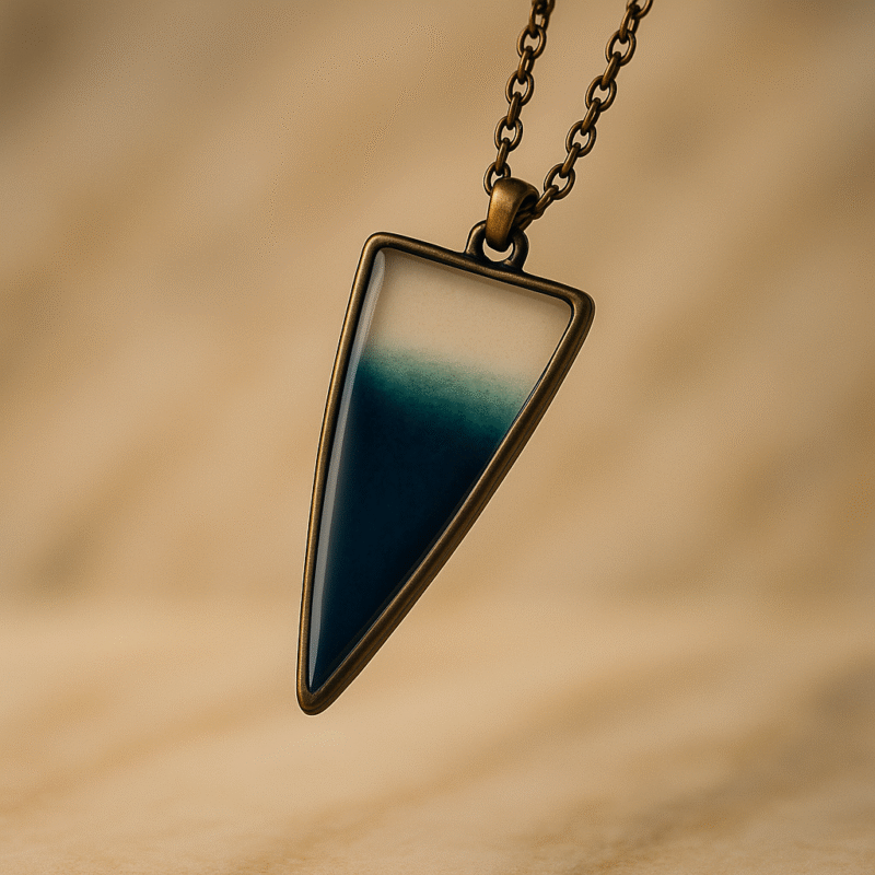 Ocean Mist Resin Pendant Necklace – Transparent Blue Gradient Arrowhead with Silver Chain - Image 2