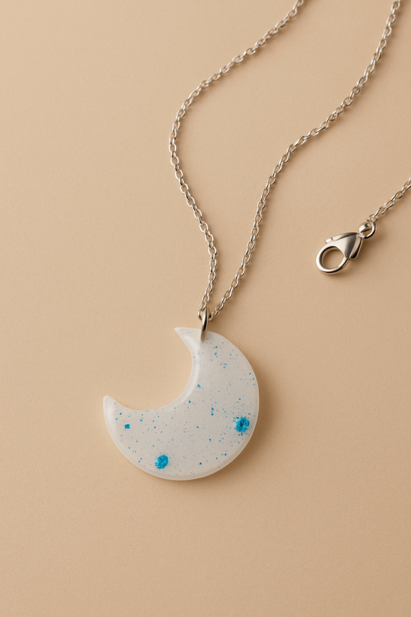 Frosted Moon Pendant Necklace – Translucent Crescent with Blue Glitter Accents