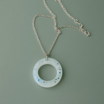 Frosted Halo Resin Necklace – Translucent Open Circle with Blue Glitter on Silver Chain